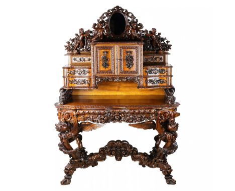  Magnificent carved bureau table in the Baroque neo-Gothic style. The terraced structure of work surfaces, with two-tiered st