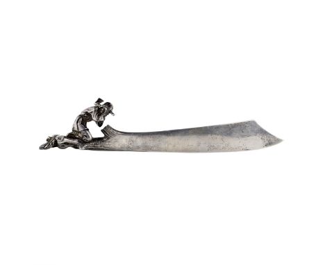  Original in plot and presentation, Faberge silver paper knife, last quarter of the 19th century. The handle of which is a fi