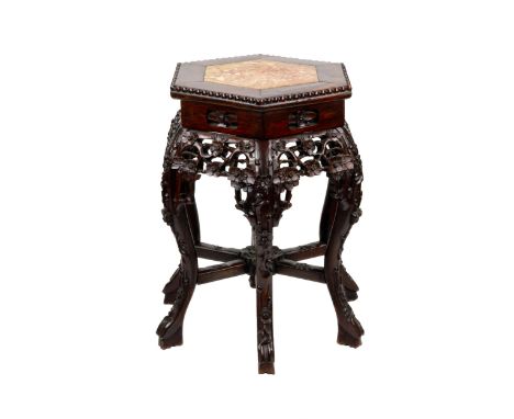  Carved, Chinese stand for a vase, mahogany with marble. Compact, solid proportions, traditional forms - the stand is decorat