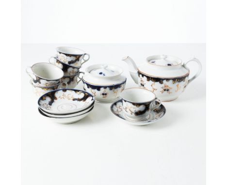  Porcelain tea set by Kuznetsov. Riga, 1860s. Consists of: teapot, sugar bowl and 4 cups with saucers and 2 cups. Massive sha