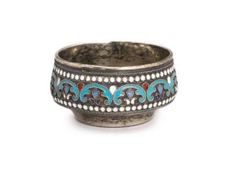 Silver salt cellar, decorated with artistic plant decoration made using cloisonne enamel technique. Residual gilding.Diameter