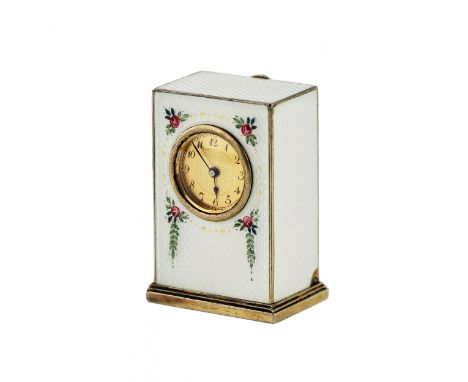 Miniature travel clock in its own case, in 925 gilded silver and guilloche enamel, first decades of the 20th century. Hierogl