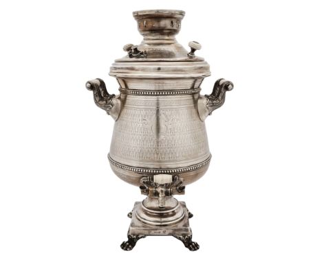  Large, silver, Russian samovar made of 84 silver, trading house I.E. MOROZOV. Mounted on a stand with four figured legs in t