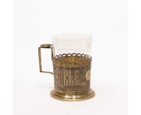  Silver glass holder with the engraved slogan Drink for health  made in the old Russian style, with a saucer under the thumb 