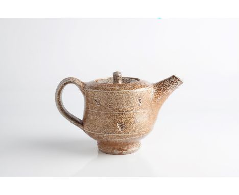 Phil Rogers (British, b.1951) Teapot salt glazed and with impressed marks impressed potter's seal 19cm across.