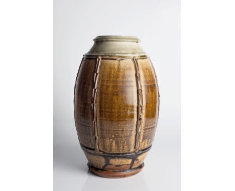 Mike Dodd (British, b.1943) Vase panelled sides and ash glaze impressed potter's seal 30cm high.