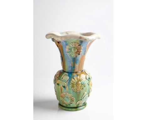 Kate Malone (British, b.1959) 'Daisy' vase with applied daisy head and foliate motifs signed 30.5cm high. Provenance: with Ad