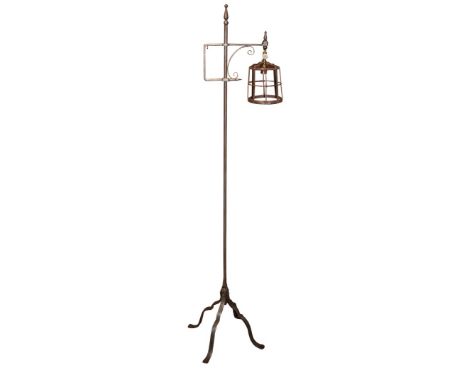 Arts & Crafts Floor standing wrought iron reading lamp in the manner of the Cotswold School with scroll iron work decoration 