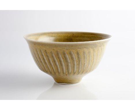 David Leach (British, 1911-2005) Bowl celadon with fluted sides impressed potter's seal 7cm high, 13.5cm diameter.