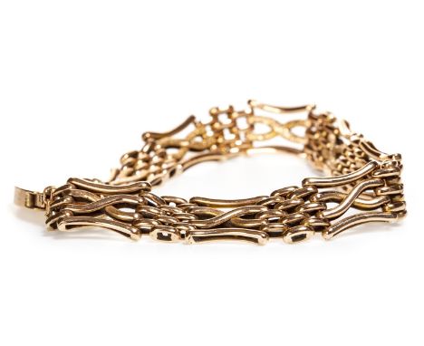 NINE CARAT GOLD GATE LINK BRACELET, formed by alternating sections 11mm wide, with padlock clasp and safety chain, the clasp 