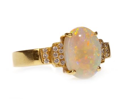 OPAL AND DIAMOND RING, the central oval opal flanked by diamonds and on diamond shoulders, marked 750, size R 1/2, 5.9g