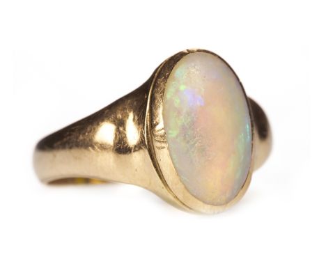 OPAL DRESS RING, with a collet set oval opal approximately 8mm long, in fifteen carat gold, size P, 4.8g