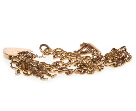 LINK BRACELET, formed by two curb link sections, with a bagpiper and harp charm, the padlock clasp marked for nine carat gold