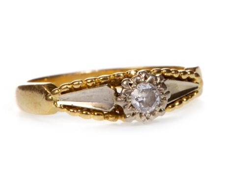 DIAMOND SOLITAIRE RING, the high set round brilliant cut diamond of approximately 0.08 carats, marked 18ct, size K 1/2, 3.2g