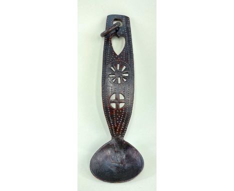 EARLY 19TH CENTURY LOVE SPOON OR LADLE boat-shaped handle to ovoid bowl, the handle with hollowed cross, wheel and heart surr