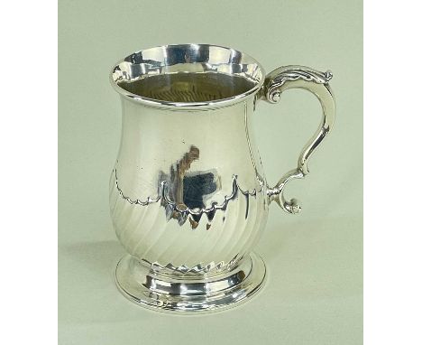 EDWARD VII SILVER BALUSTER TANKARD, Hunt &amp; Roskell Ltd., London 1908, half wrythen fluted body, leaf capped double C-scro