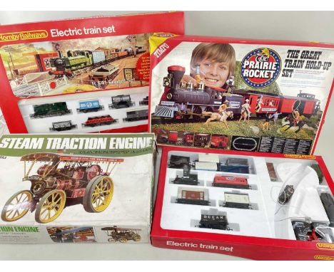 FOUR BOXED TOY SETS, including Hornby R541 GWR electric Freight Set, another similar lacking carded info, Timpo Prairie Rocke