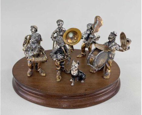 SET VITTORIO ANGINI SILVER CLOWN MUSICIANS, including trumpeter, violinist, sousaphonist, accordionist, guitarist, drummer an