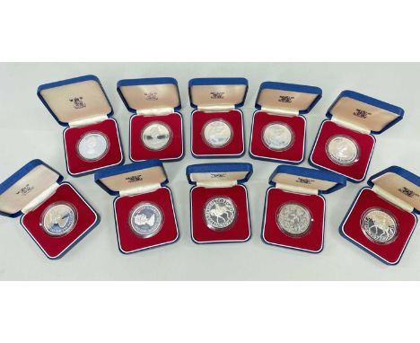 SET SEVEN 1977 JUBILEE SILVER PROOF CROWNS, Jersey, Guernsey, Falklands Islands, Gibraltar, Tristan da Cunha, St Helena, &amp