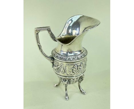 ARTHUR GRAF SILVER JUG, having exaggerated flared lip, repousse banded decoration, raised on four hoof feetProvenance: privat