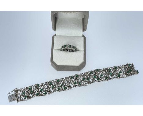 WHITE METAL DIAMOND & EMERALD ETERNITY RING, ring size L, 5.4gms, in a 'Colombian Emeralds International' ring box, together 