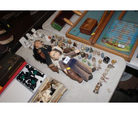 A collection of various Wade Whimsies, a Horsman vintage doll, two dolls in the form of sailors, various crested china includ