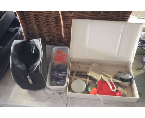 A wicker fishing basket with hinged lid; small folding stool; floats; lures and a Stratos FS4000E fishing reel