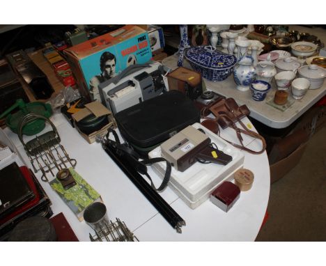 A Magnon duo projector, a collection of various cameras including a Chinon 670 camcorder, Brownie etc