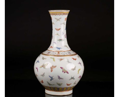 A Chinese butterfly vase, Guangxu mark and probably of the period, the neck with gilt rim above a ruyi head band, the shoulde