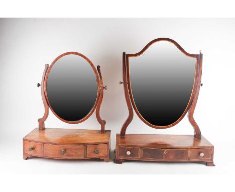 A George III marquetry inlaid and satinwood strung, mahogany bowfront dressing table mirror with oval mirror plate, the base 