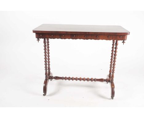 A Victorian figured rosewood rectangular side table. With serpentine beaded frieze on bobbin turned end stile supports and in