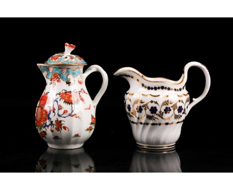 An 18th century,(first period) Worcester porcelain fluted cream jug and cover, painted with the "Jabberwocky" pattern. With f