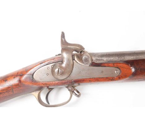 An Enfield three band percussion rifle with socket bayonet, the side lock plate stamped VR, 1858 Tower, the butt with struck 