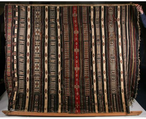 An African flat weave, probably Berber, with supplemental weft, 222cm wide x 164cm214cm x 180, an African strip woven panel, 