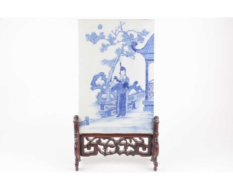 A Chinese blue &amp; white porcelain table screen, Qing, 19th century, of rectangular form, painted with a scholar reading a 