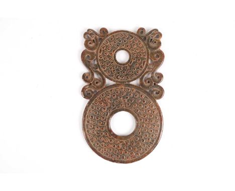 A Chinese carved and pierced russet/moss green jade double Bi disc with cloud detail. Weight 319 grams. 19.5 cm long x 11.5 c