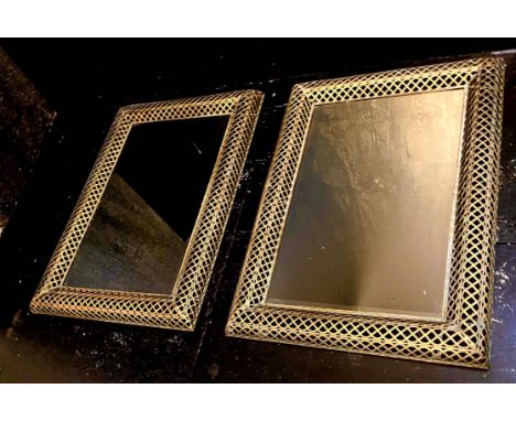 ARCHITECTURAL WALL MIRRORS, a pair, rectangular with pierced gilt metal frames, 100cm H x 70cm. (2) 