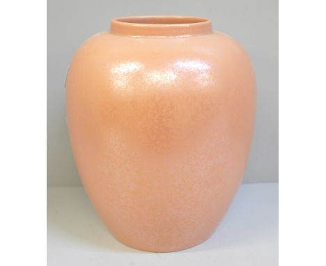 A Poole pottery salmon pink lustre vase, 22cm 