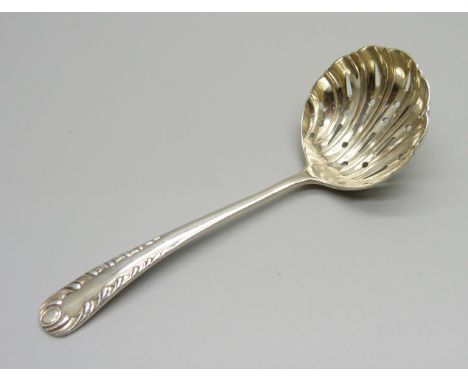 A small silver sifter ladle, Sheffield 1895, 21g 