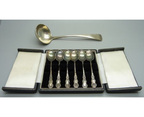 A silver ladle and a cased set of six silver coffee spoons, 102g 