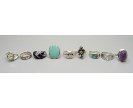 Nine silver rings 