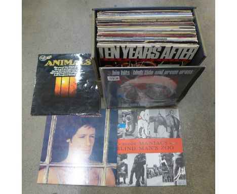 A record box with rock LP records; Rolling Stones, Ten Years After, Bruce Springsteen, Billy Joel, etc. 