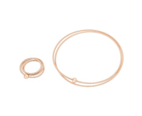 NIESSING Set: "Colette" Ring und Armreif, jeweils besetzt mit 1 Brillanten, zus. ca. 0,04 ct, gute Farbe und Reinheit, RG 18K
