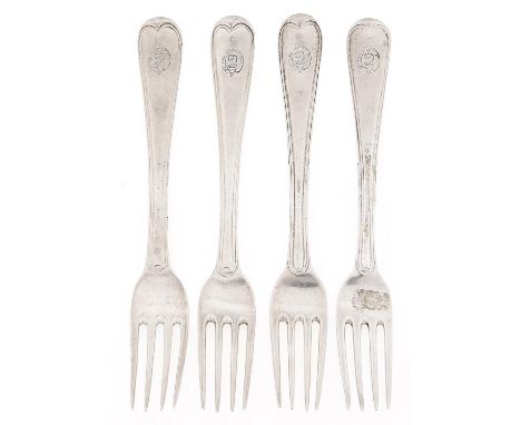 A set of four Irish George III silver table forks, Old English Thread pattern, crested, by Michael Keating, Dublin 1785, 8ozs