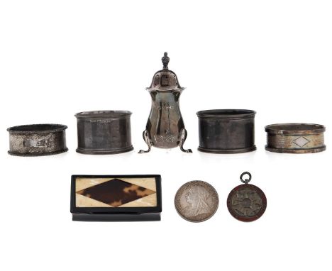 Four silver napkin rings,&nbsp; various makers and dates,&nbsp; a silver pepperette,&nbsp; silver and enamel watch fob shield
