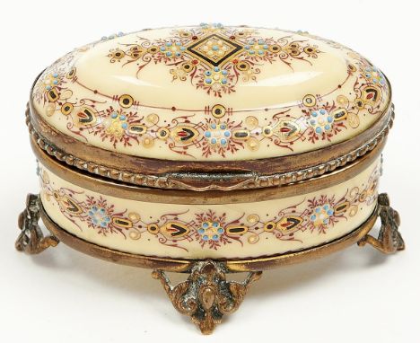A miniature oval Palais Royale brass mounted yellow enamel trinket box, late 19th c, lined in buttoned silk, 88mm l, printed 
