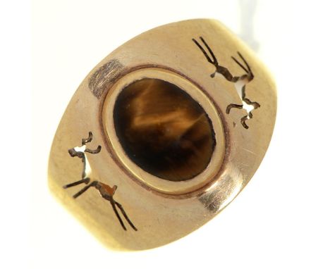 A tiger's eye ring, in gold with pierced shoulders, 4.2g, size L  Light wear scratches