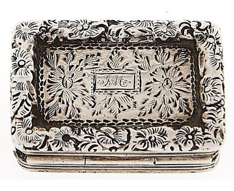 A William IV silver vinaigrette,&nbsp; the lid with chased border, foliate grille, 25mm, by Thomas Shaw, Birmingham 1831, 7dw