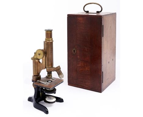 A brass compound microscope, E Leitz Wetzlar, No 93684, c1900, focusing by rack work with fine adjustment at the top of the l
