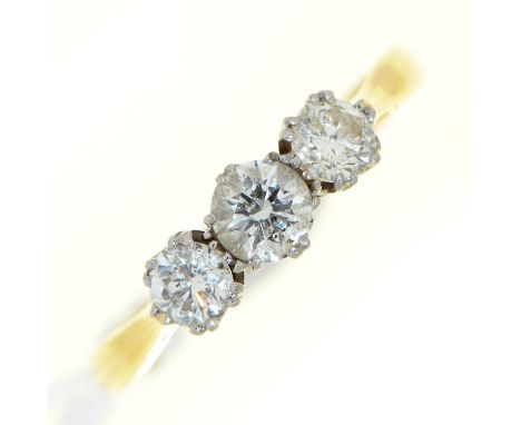 A three stone diamond ring, in gold marked 18ct &amp; PLATINUM, 2.3g, size M  Good condition